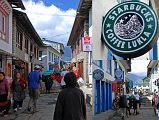 15 10 Lukla Street - Yaks, Shopping, Eating, Sleeping, And Yes, Starbucks Coffee I walked down the main street of Lukla, passing the shops, restaurants, lodges, coffee shops including Starbucks, and avoiding the yaks.